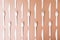 Pattern made of biodegradable eco friendly wooden cutlery on brown background