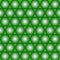 Pattern of many dark green balls on light green background.