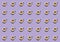 A pattern with mugs filled with coffee and milk on a lilac background