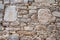 Pattern of an old and authentic european wall`s surface made of various decorative stones