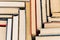 A pattern of old books with a top view. Solid background