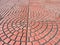 Pattern of orange bricks on the footpath