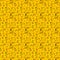 Pattern of orange sparkling stars on a yellow background