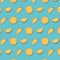 Pattern of oranges slices isolated on blue background.