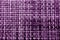 Pattern of plastic tablecloth with blur effect in purple tone