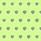 Pattern of plates with lightly fried brussels sprouts on the neon green drop