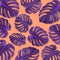 Pattern purple tropical leaf monstera flat lay on pastel orange background. Summer concept art. Minimal surreal.