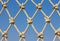 Pattern the rope mesh on blue sky