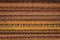 Pattern of Rusty Reinforced Steel Bars in a Stack with Contrast