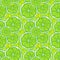 Pattern of silhouettes of orange slices on a green background