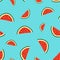 Pattern with slices of watermelon. Blue background