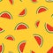 Pattern with slices of watermelon of different sizes on a yellow background