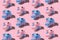 Pattern with SLR camera on pastel color background