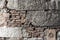 Pattern of stone wall structure with various foundation and brick. Old wall European home