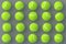 Pattern of tennis balls on gray background. International championship