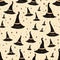 A pattern of witches hats and stars. Seamless pattern.