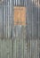 Pattern of wooden wall of an agricultural straw storing hut in rural landscape