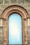 Patterned arched cornice above the window under the roof on the facade of the Church of St. Mesrop Mashtots