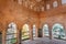 Patterned arches inside the arabic architecture style palace, 14th century fortress complex of Alhambra