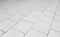 Patterned paving tiles, ceramic brick floor background - monochrome