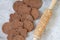 Patterned rolling pin next to homemade cookies from above