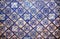 Patterned spanish design of old house tile. Historical walls decoration in Spain