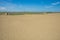 Patterns in the sand below blue sky in the Great Sandhills of Saskatchewan, Canada