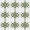 Patterns of spruce branches in the form of snowflakes on a white background.