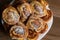 Patties with cottage cheese and raisins piled up on a plate.