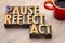 Pause, reflect, act concept - word abstract in wood type