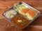 Pav Bhaji is a fast food dish from India, Thick and spicy vegetable curry, served with a soft bread roll or Bun Paav and butter.