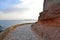 Paved coastal walkway on a summer evening