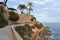 Paved coastal walkway on a summer evening