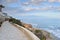 Paved coastal walkway on a summer evening