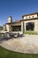 Paved Dining Area Against Modern House