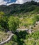 Paved, narrow path in the mountains