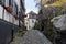 Paved narrow road with half-timbered houses in Monschau, Eifel