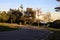 Paved path in a park by the seaside at twilight