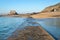 Paved path to Grand Be and Petit Be islands at low tide, Saint Malo, Brittany, France