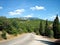 Paved road with sharp turns in the picturesque foothills in the South on a clear day