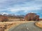 A paved rural road in the South Island of New Zealand in the afternoon