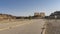 A paved sidewalk leads to the ancient temple of the Choir