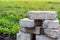 Pavement bricks and paving slabs on the grass