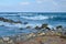 Pavement damaged by waves outside Limenas Chersonisou Crete Island Greece