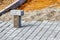 Pavement repairs and paving slabs laying on the prepared surface, with tile cubes in the background. Laying paving slabs in the