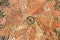 Pavement texture with gears and bricks in Montjuic, Barcelona, Spain.