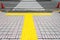 Pavement with Yellow line step for blind waiting standing on the