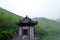 A pavilion at the lake with mountains background