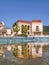 Pavilion of a luxury resort reflected in a pond, Sanya, China