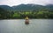 Pavilion in middle of Lulin lake in Lushan national park Jiangxi China